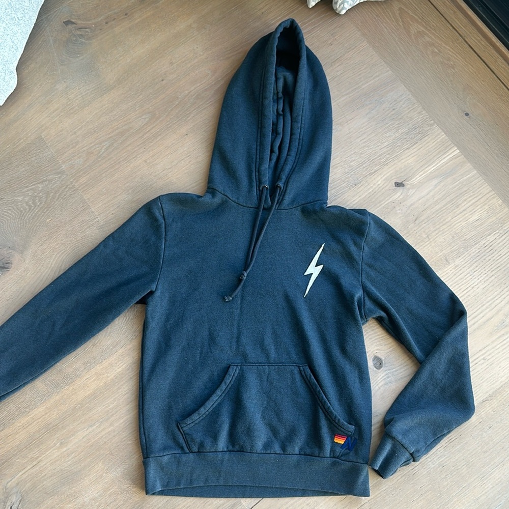 Aviator Nation hooded sweatshirt. Dark Gray, white bolt.